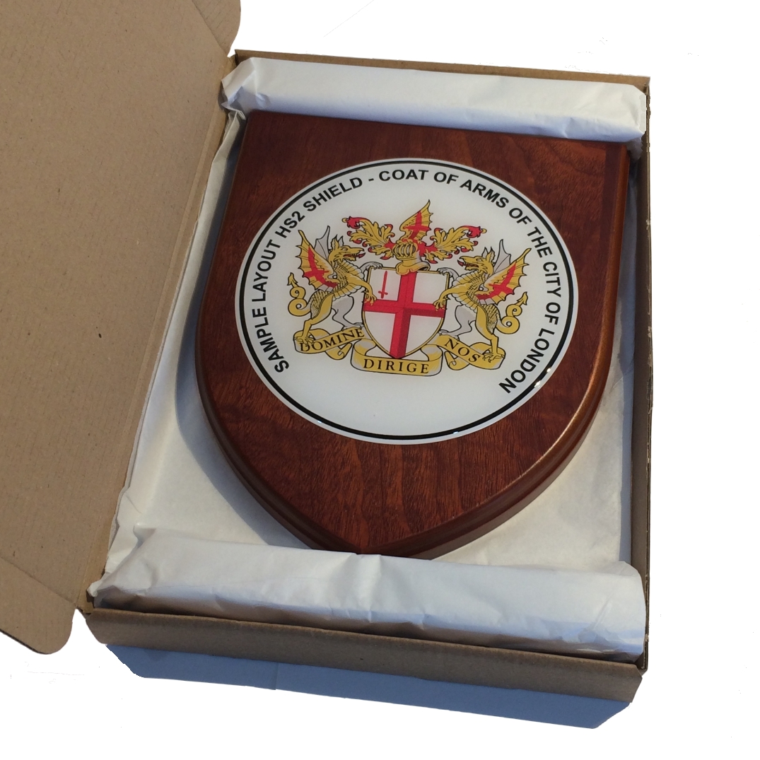 Presentation shield with large round shaped centrepiece.